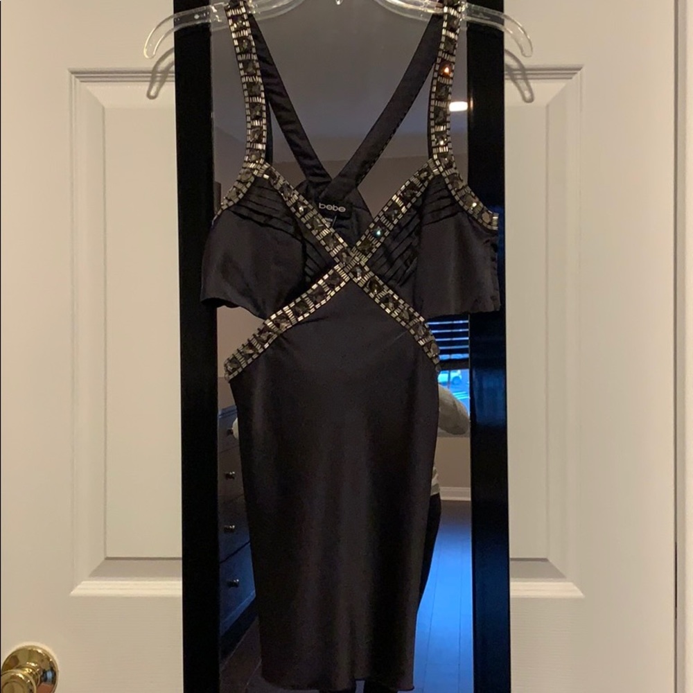 Bebe cut out sides tank top